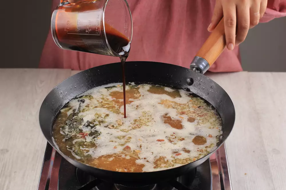 Adding Sauce to Stir Fry
